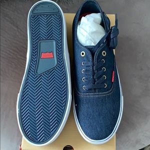 New pair of Levi denim boat shoes. Never worn.